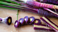 Purple Haze carrot vegetable seeds for kitchen gardens and outdoor planting.